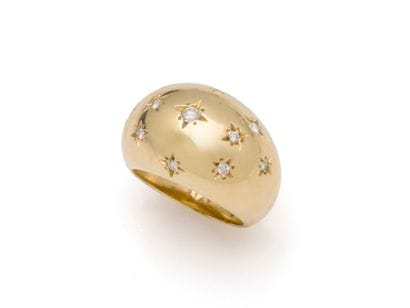 Dome-shaped ring in 750 thousandths gold,...