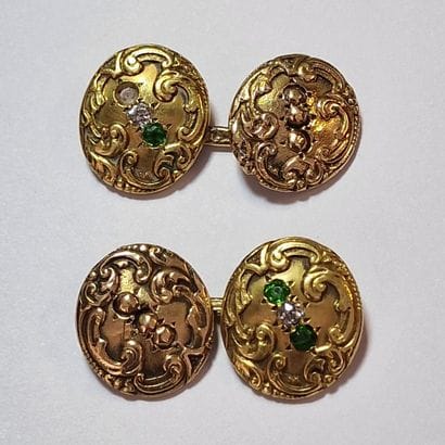 PAIRE DE BOUTONS DE MANCHETTES de la Fin...