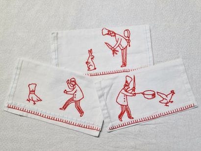 SUITE DE 3 ETUIS A SERVIETTE DE TABLE en...
