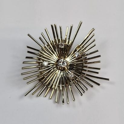 BROCHE RAYONNANTE Circa 1960 en or gris 750...