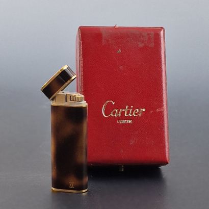 CARTIER - GOLD-PLATED POCKET BRIQUET in gold-plated...