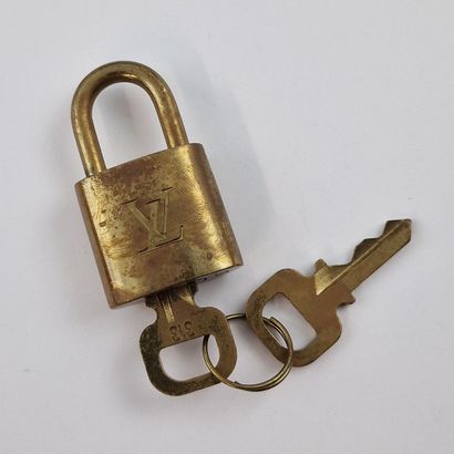 Louis VUITTON - CADENAS en laiton doré et...