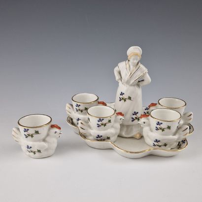 White porcelain and gold filet egg cup holder...