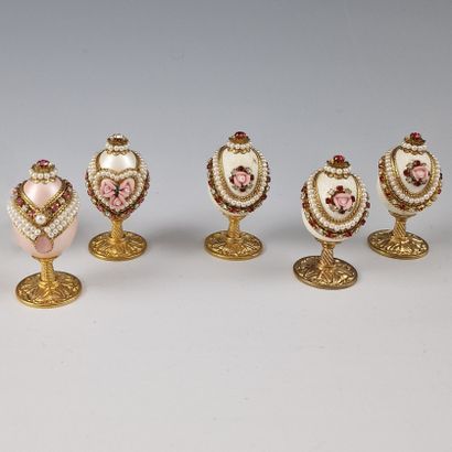 SET OF 5 OVOID STAUETTES ON ROUND STAND FOR...