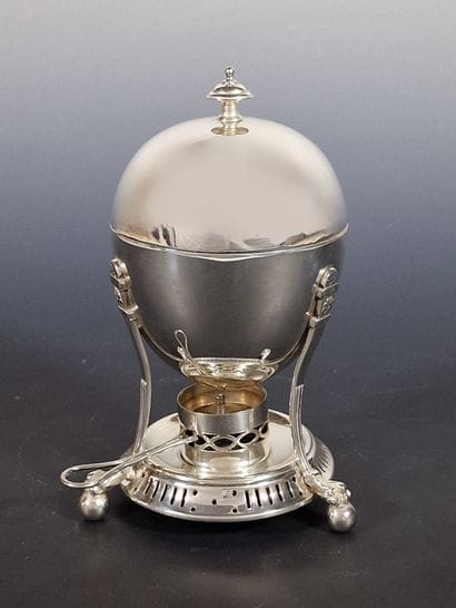EGG WARMER egg-shaped on tripod base in re-silvered...