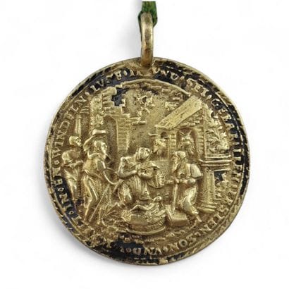 MEDAILLE en argent doré, avec bélière, figurant...