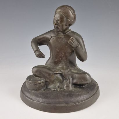 EARLY 20TH CENTURY INDOCHINESE SCHOOL 
Seated...
