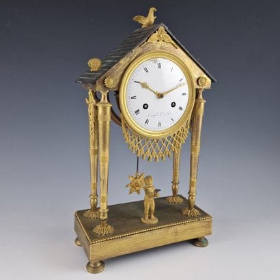 Empire period gilt bronze and patinated Temple...