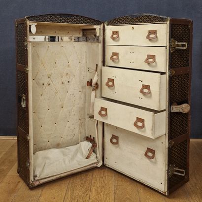 GOYARD - WARDROBE in black goyardine, vulcanized...