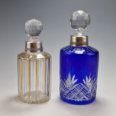 BACCARAT - TWO cut-crystal flasks mounted...