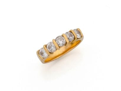 JARRETIERE RING in 750 thousandths gold set...
