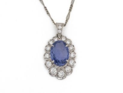 PENDANT in 750 thousandths white gold, adorned...