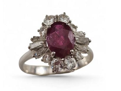 BAGUE MARQUISE en or gris 750 millièmes ornée...