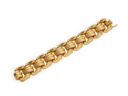 BEAU BRACELET ARTICULE en or 750 millièmes...