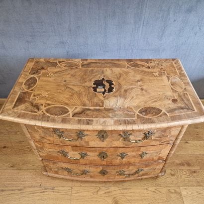 CHEST OF DRAWERS with curved front—Probably...