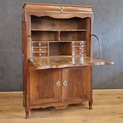 Louis XV-era DOUCINE SECRETARY in walnut,...