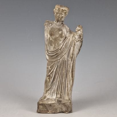 VOTIVE STATUETTE depicting a young woman...