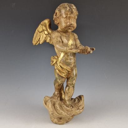 STATUETTE OF A CHILDREN'S ANGEL CARRYING...