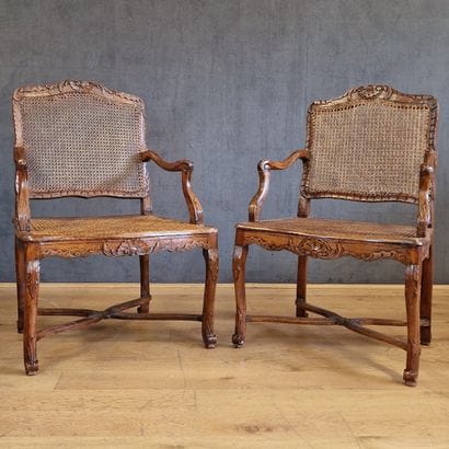TWO CANE ARMCHAIRS that may form a Regency-period...