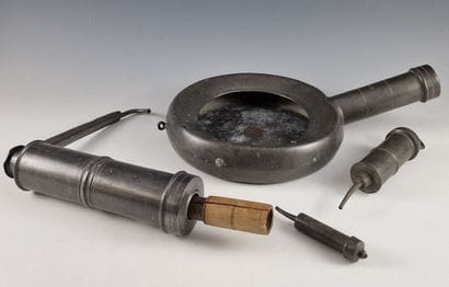 SEVEN pewter enema sets, including one SOIT-MEME...