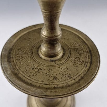 Bronze TORCH. Circular base; turned shaft...