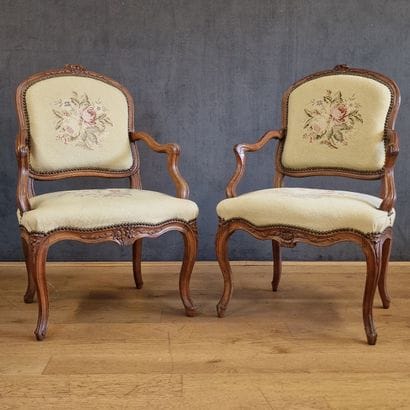 PAIR OF ARMCHAIRS with flat backs and curved...