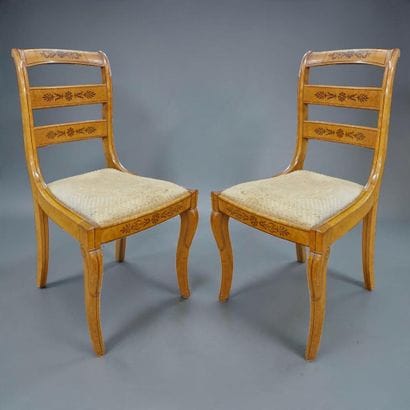 PAIR OF CHAIRS WITH A BANDED BACKREST AND...