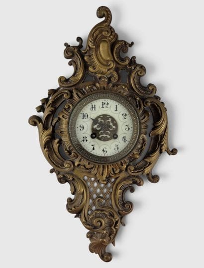 SMALL WALL CLOCK in a violin-shaped Louis...