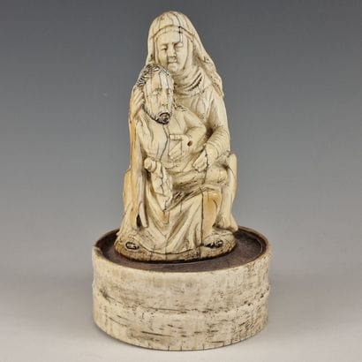 VIRGIN OF MERCY, carved in the round from...