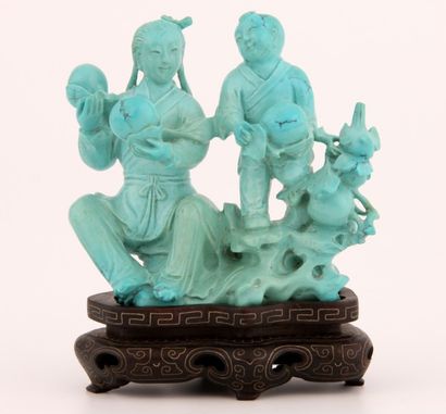 Chine - Groupe en turquoise sculptée représentant...