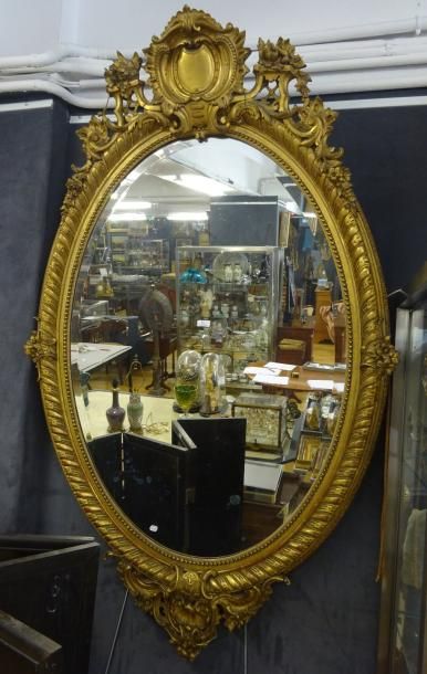 GRAND MIROIR OVALE d'Epoque Napoléon III...