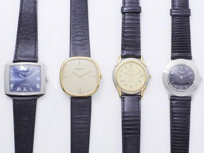Lot acier et métal doré composé de 4 montres...