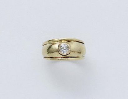 Bague jonc godronnée en or 750 millièmes,...