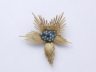 Broche clip en or 750 millièmes, à décor...