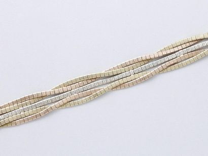 Bracelet ruban 3 tons d'or 585 millièmes,...