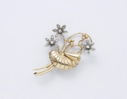 Broche 2 tons d'or 750 millièmes, stylisant...