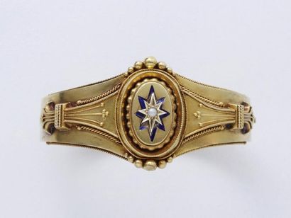 Bracelet rigide ouvrant en or 585 millièmes,...