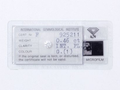 Diamant rond brillanté sous scellé.

Poids...