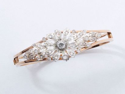 Bracelet jonc ouvrant en or 750 et argent...