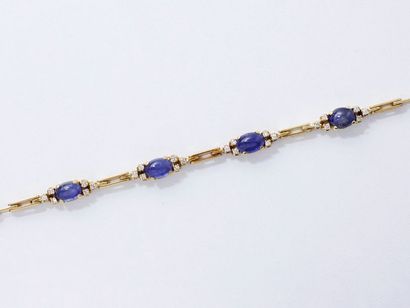 Bracelet articulé en or 750 millièmes, décoré...