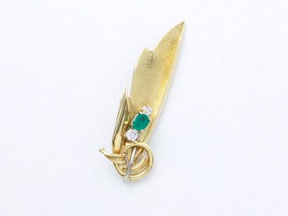 Broche 2 tons d'or 750 millièmes, stylisant...
