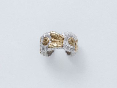 BUCCELLATI ''BLOSSOMS''

Bague jonc ouvert...