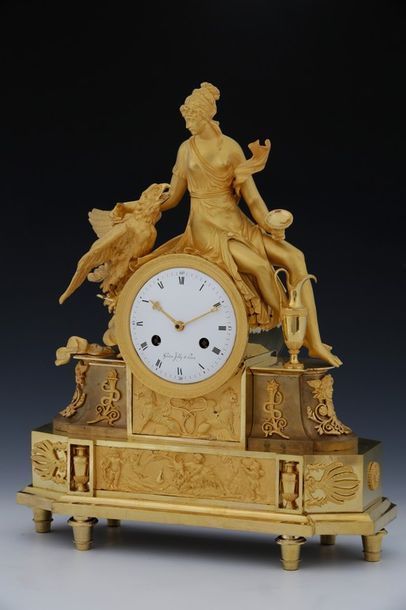 PENDULE HÉBÉ ET JUPITER 

Epoque Empire

Signée...