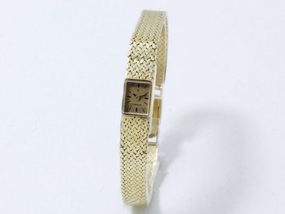 411/ OMEGA

Montre bracelet de dame en or...