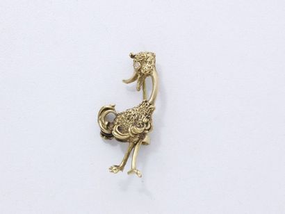 Broche or 750 millièmes sculpté stylisant...