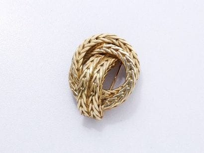 HERMES

Clip de revers en or 750 millièmes...