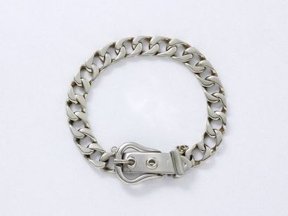 HERMES 

Bracelet articulé en or 750 millièmes...