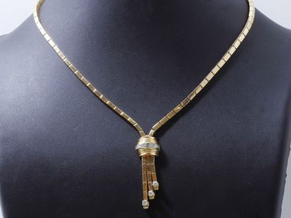 Collier négligé en or 750 millièmes, composé...