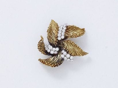 Élégant clip de revers en or 750 sculpté...