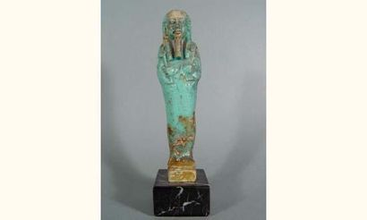 EGYPTE
Ouchebti en fritte bleue. Anépigraphe....